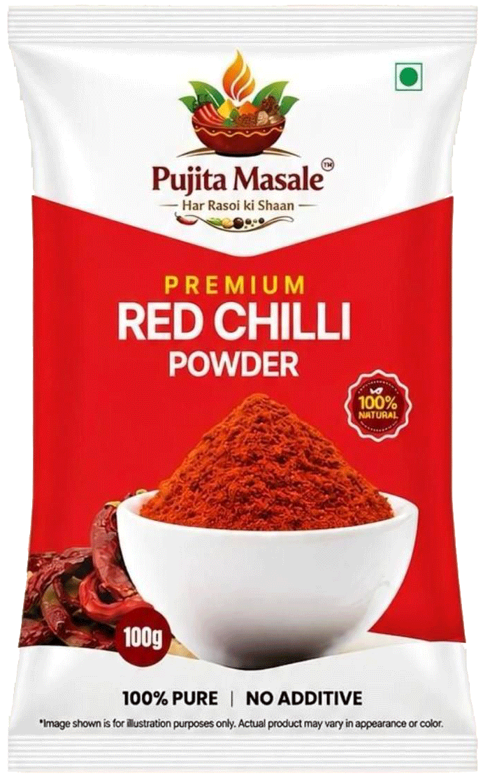 Vibrant red chilli powder in traditional brass bowl